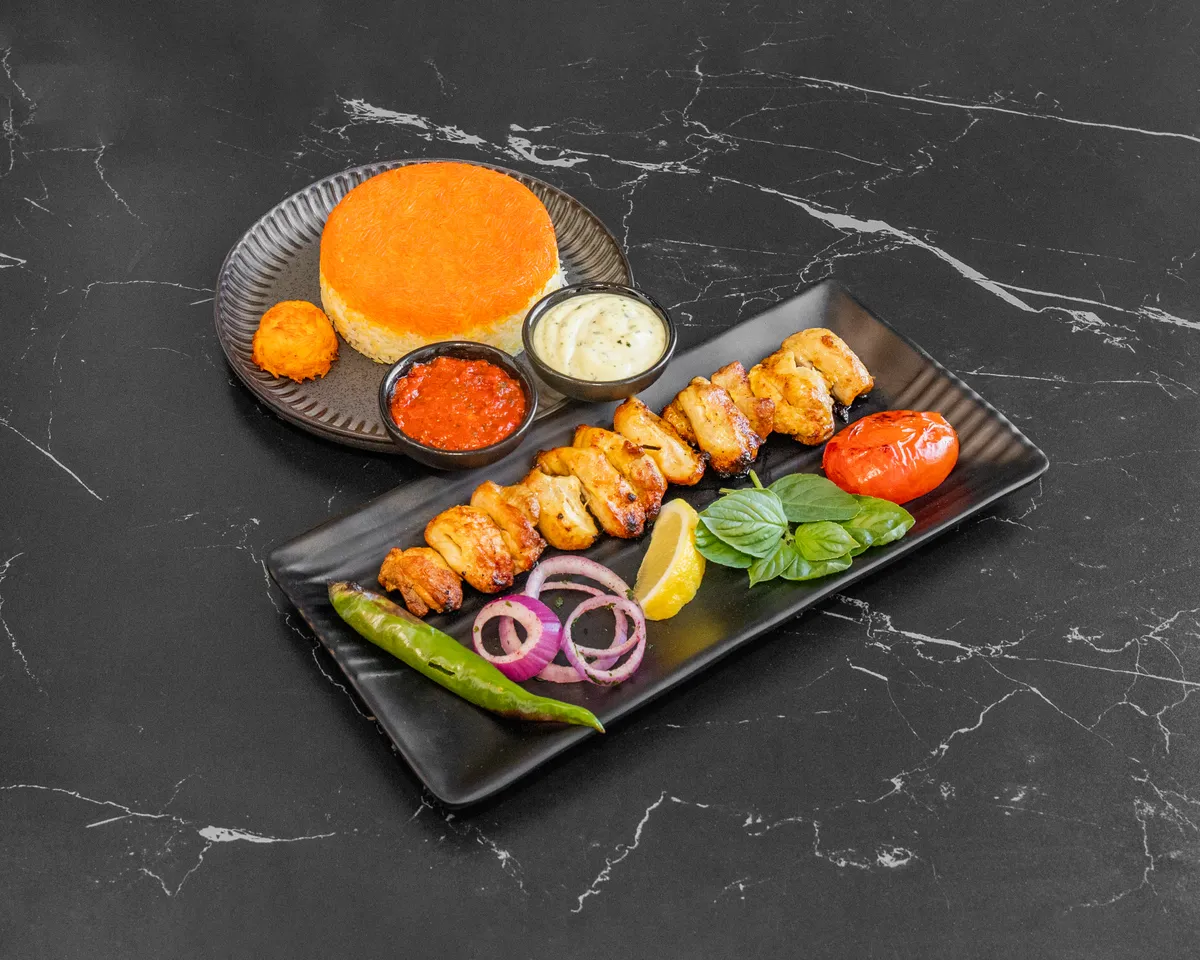 Grilled chicken kebab with saffron rice