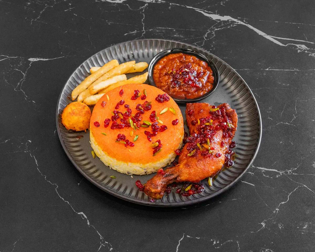 Zereshk polo with chicken and bearberries